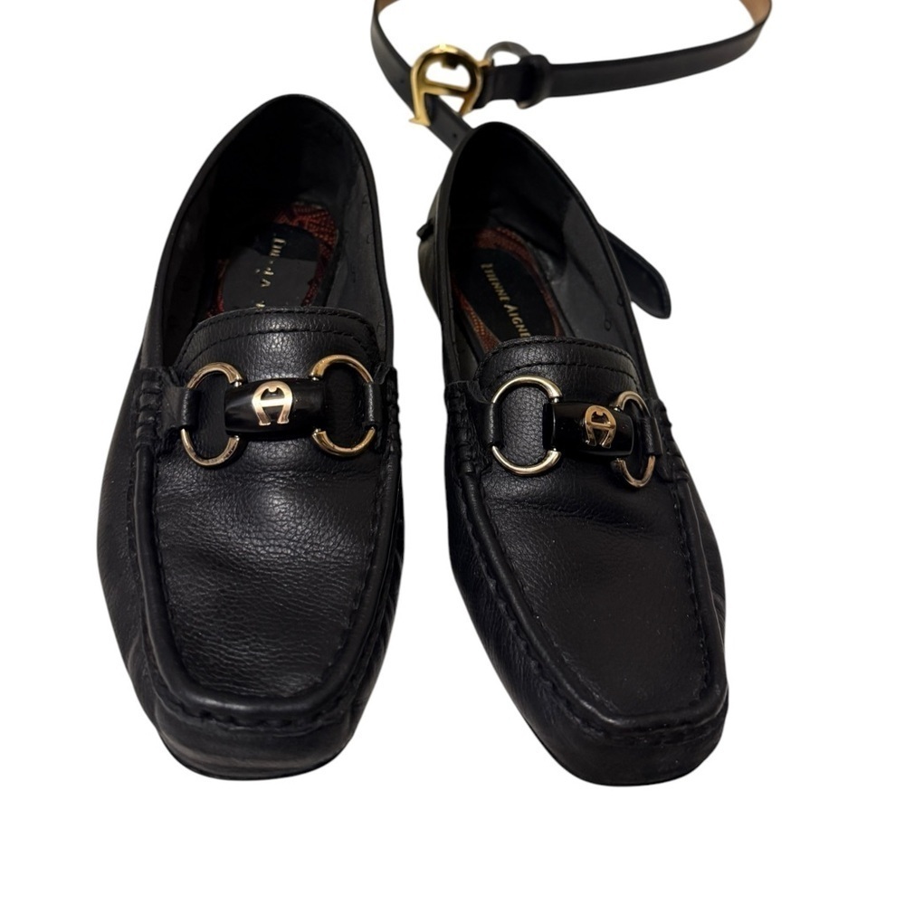 Etienne Aigner loafers, characterized by the brand's signature "A" logo